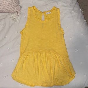 Yellow ruffle tank top.